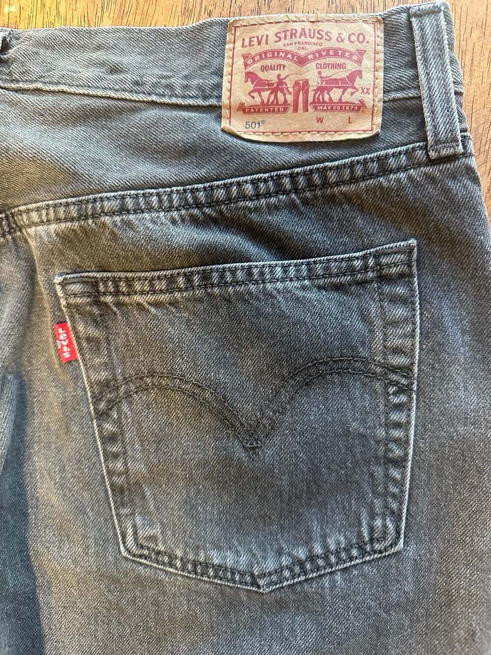 Levi’s 501 Faded Black Jeans Raw Hem Straight Leg Button Fly 31x32